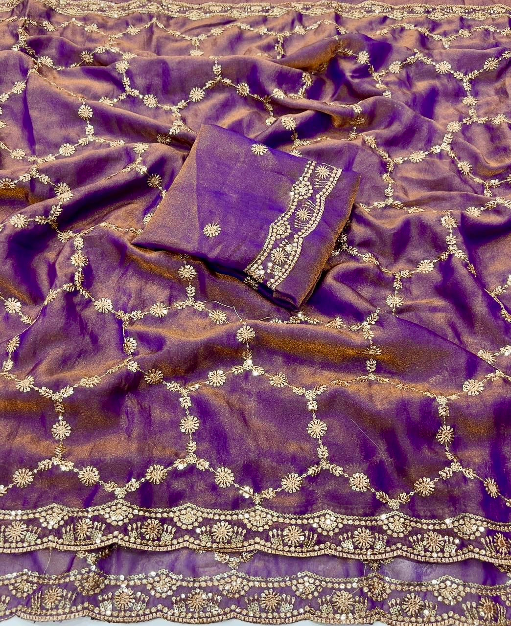 Purple fabric with intricate gold embroidery