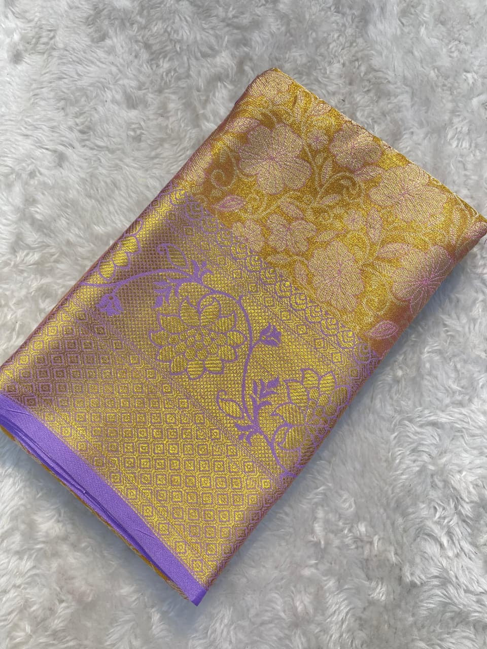 Decorative fabric with floral patterns on a textured surface