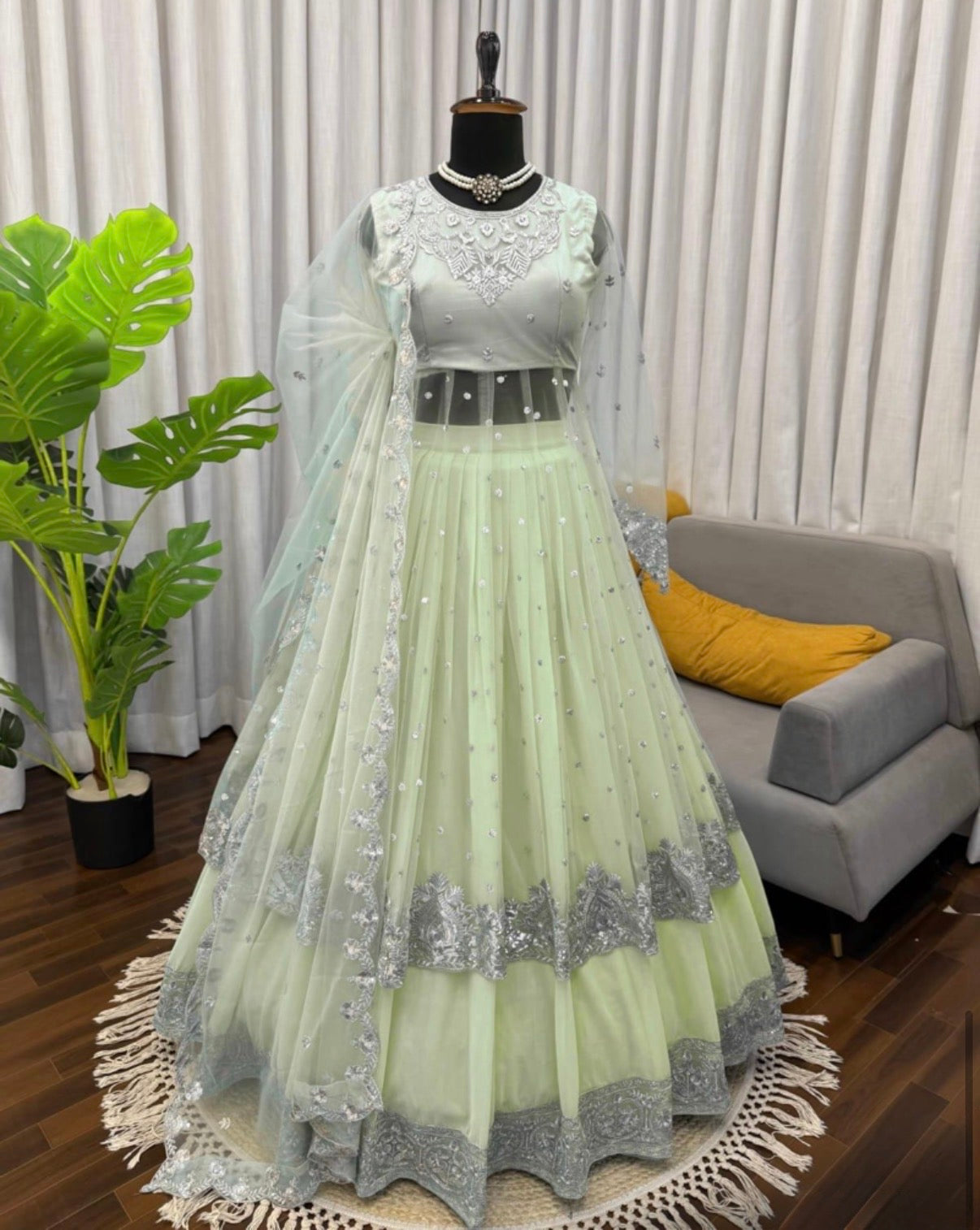 Faux Georgette Gown Lehenga Set with Sequins Work & Net Dupatta