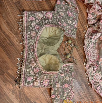 Decorative floral-patterned fabric on a wooden floor