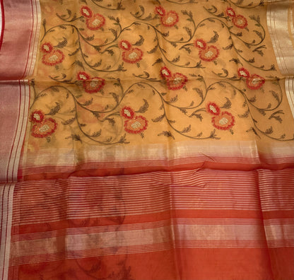 Saree with floral patterns on a beige background