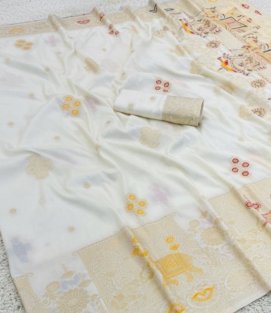 White saree with colorful floral patterns on a textured surface
