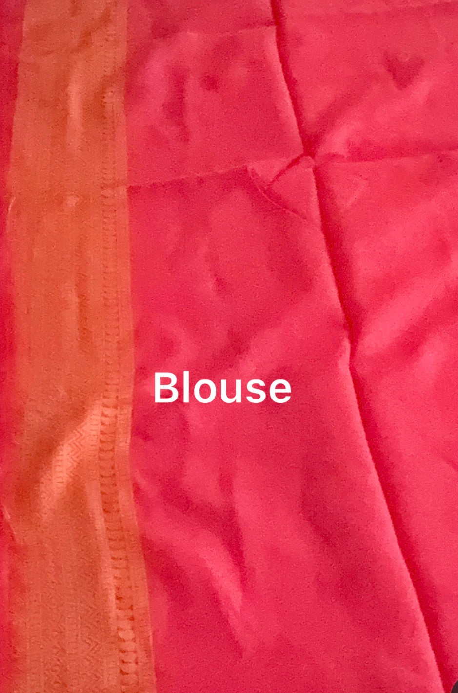 Close-up of a pink blouse with 'Blouse' text overlay