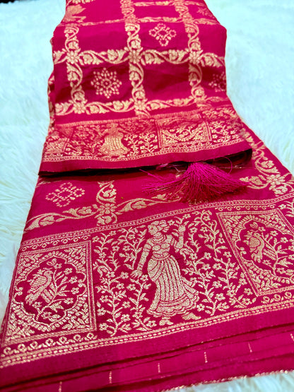 Pink saree with gold embroidery on a white background