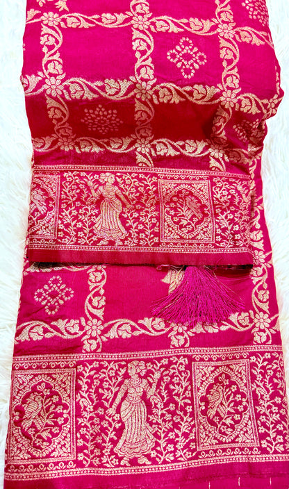 Pink and white patterned fabric with tassels on a white background