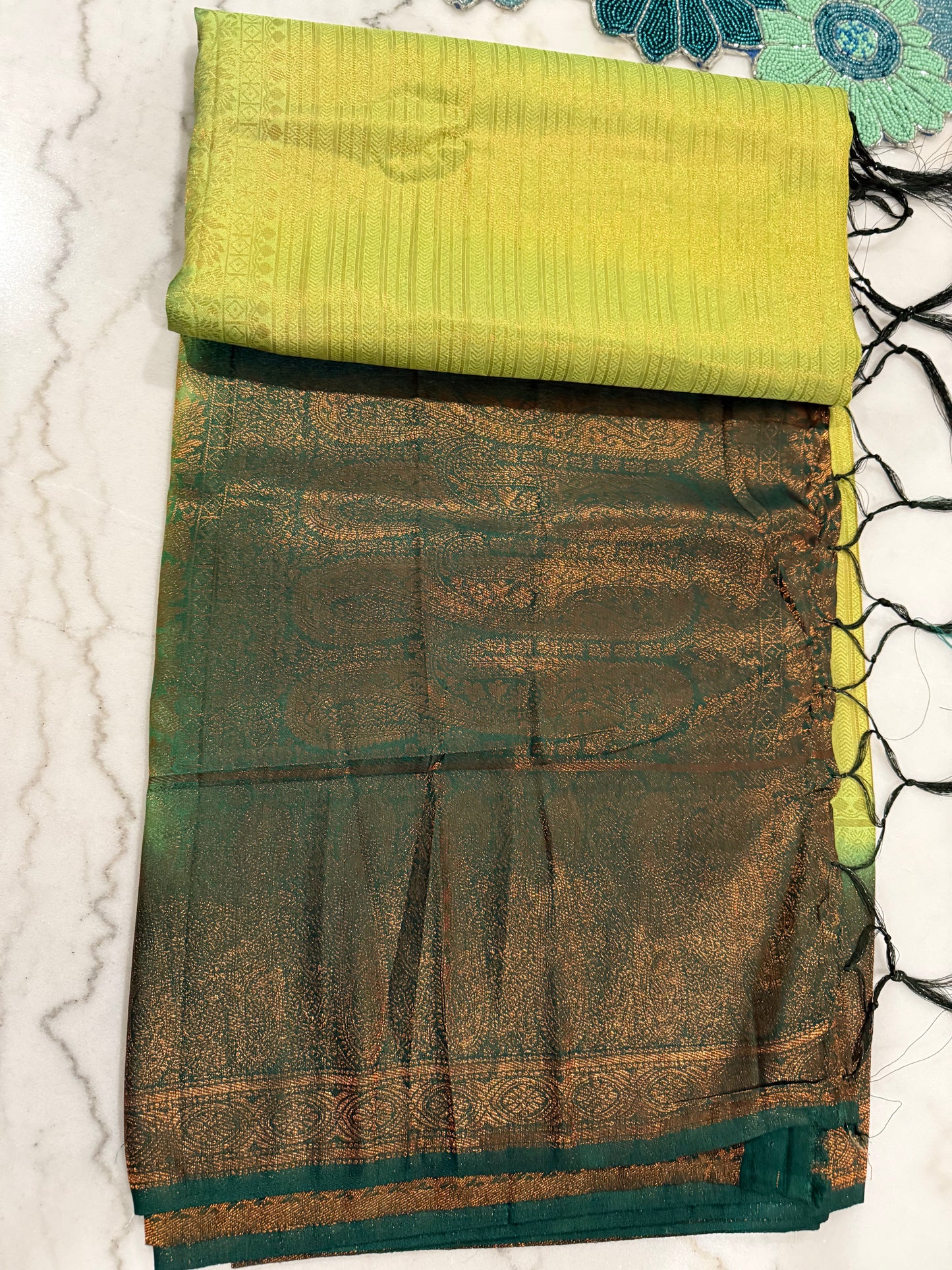 Regal Bloom Maroon & Gold Silk Saree with Green Accents