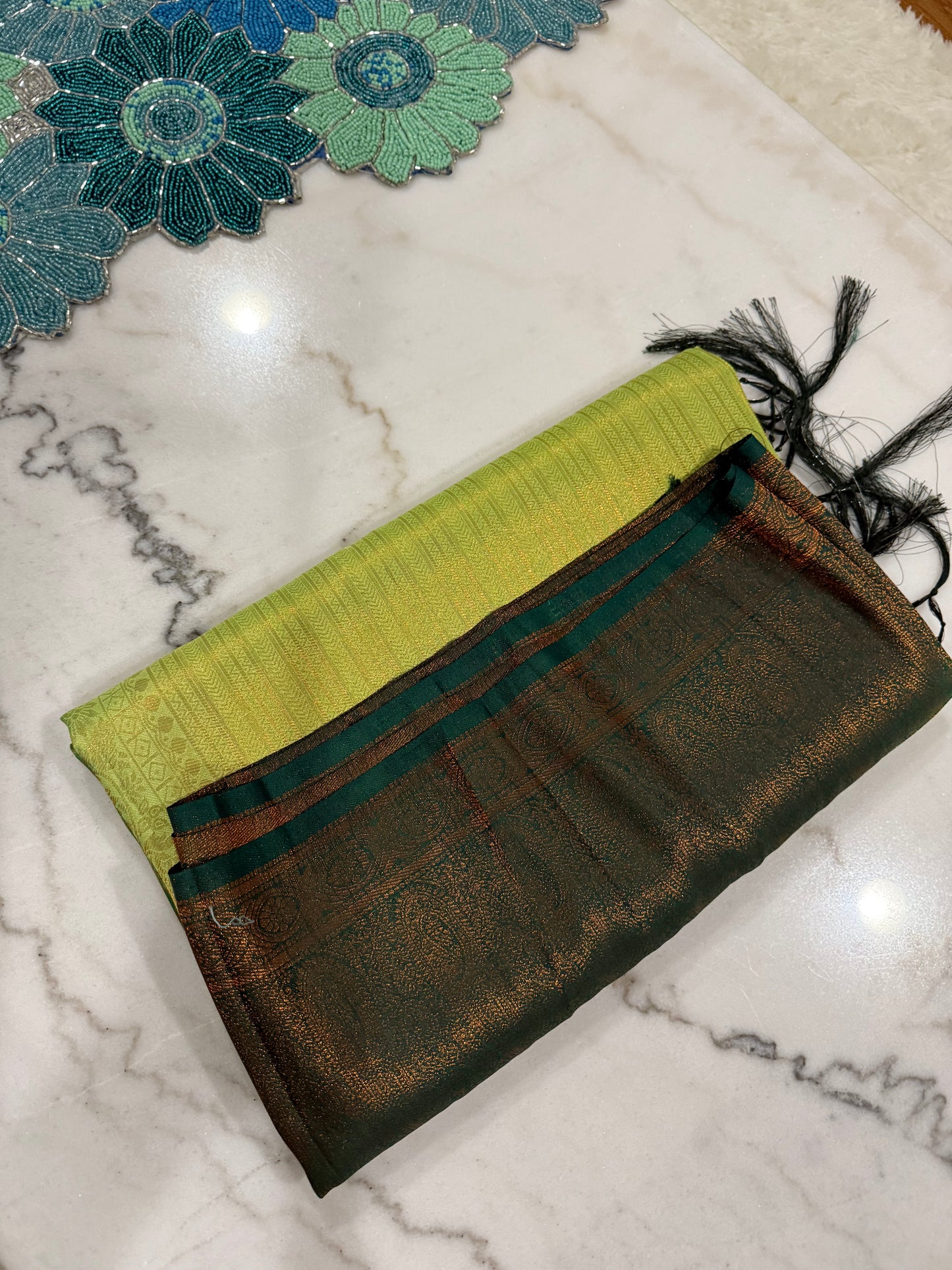 Regal Bloom Maroon & Gold Silk Saree with Green Accents