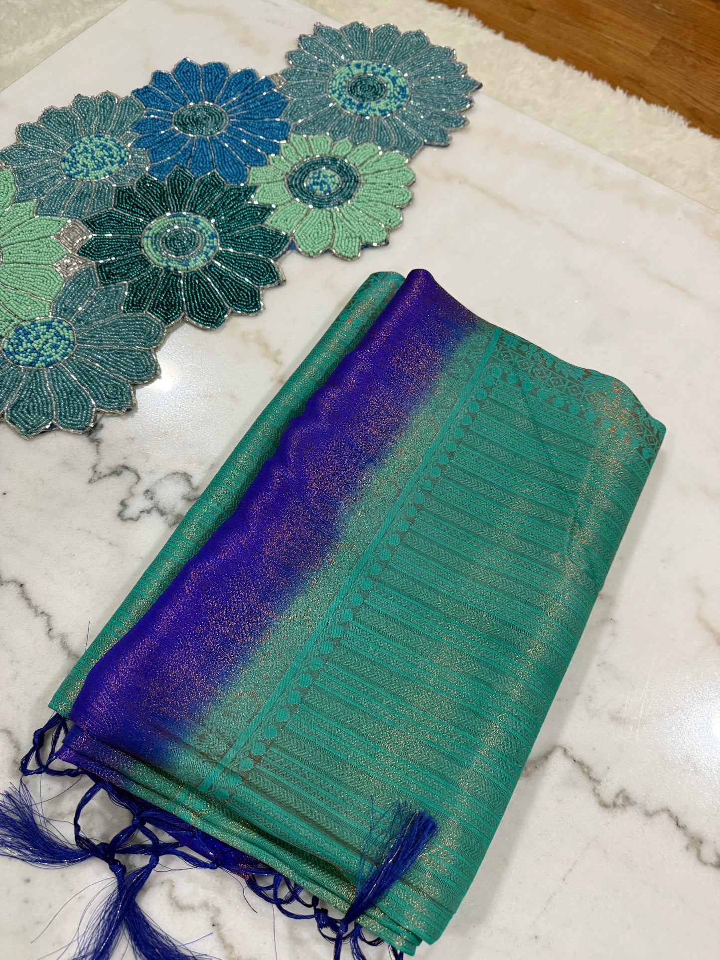 Regal Bloom Maroon & Gold Silk Saree with Green Accents
