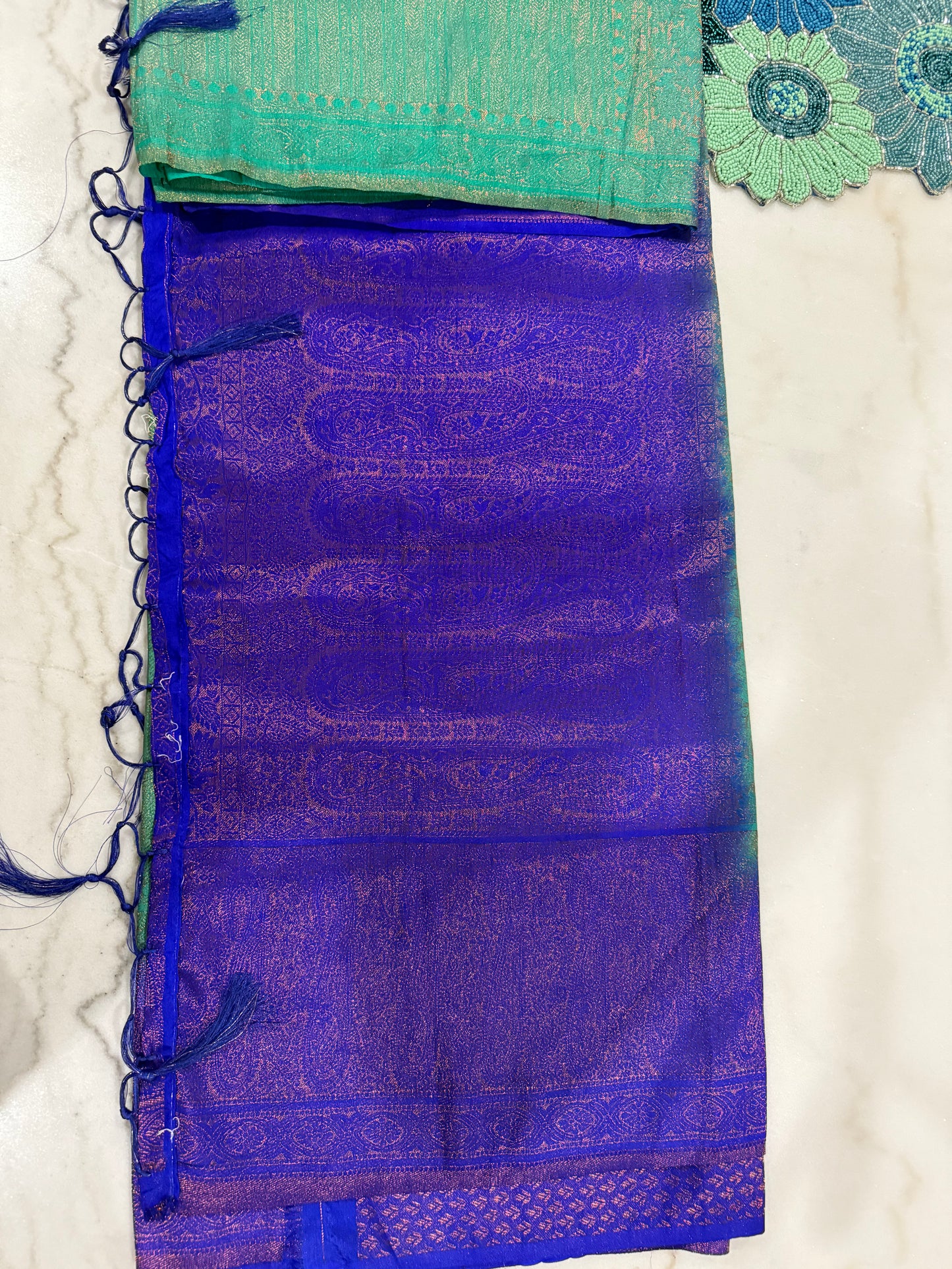 Regal Bloom Maroon & Gold Silk Saree with Green Accents