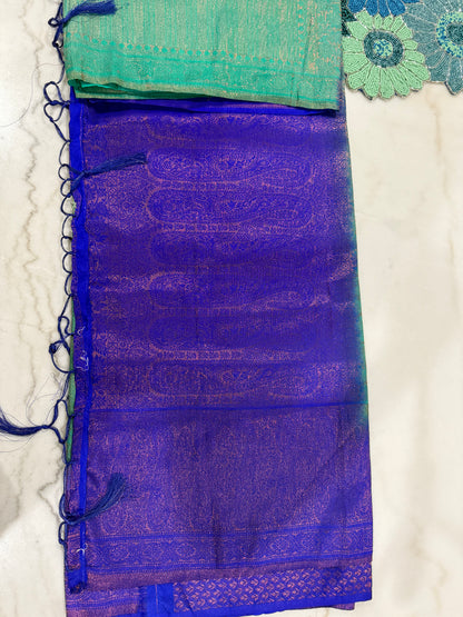 Regal Bloom Maroon & Gold Silk Saree with Green Accents